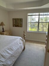 3960 Deer Crossing Ct, Unit 202 in Naples, FL - Foto de edificio - Building Photo