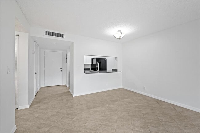 10001 W Atlantic Blvd, Unit 218 in Coral Springs, FL - Building Photo - Building Photo