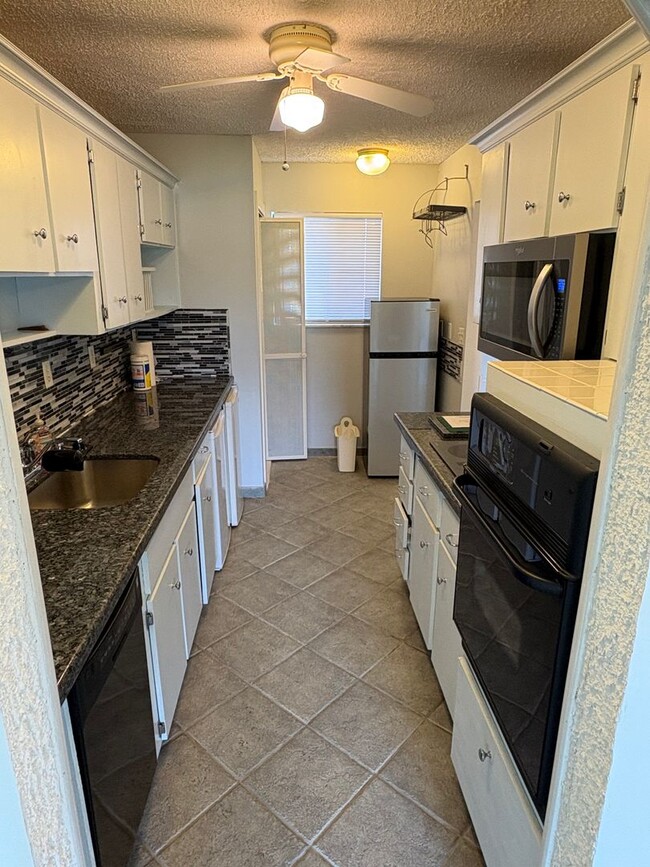 5463 SE Miles Grant Rd in Stuart, FL - Building Photo - Building Photo