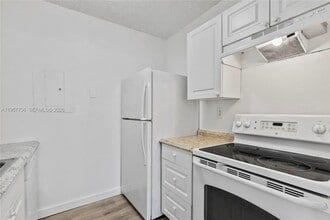 1133 Benoist Farms Rd in West Palm Beach, FL - Building Photo - Building Photo