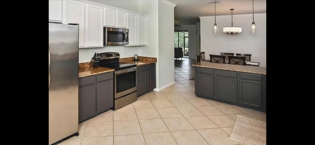 13555 San Georgio Dr in Estero, FL - Foto de edificio - Building Photo