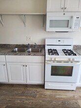 1256 1/2 Rolland Curtis Pl in Los Angeles, CA - Building Photo - Building Photo