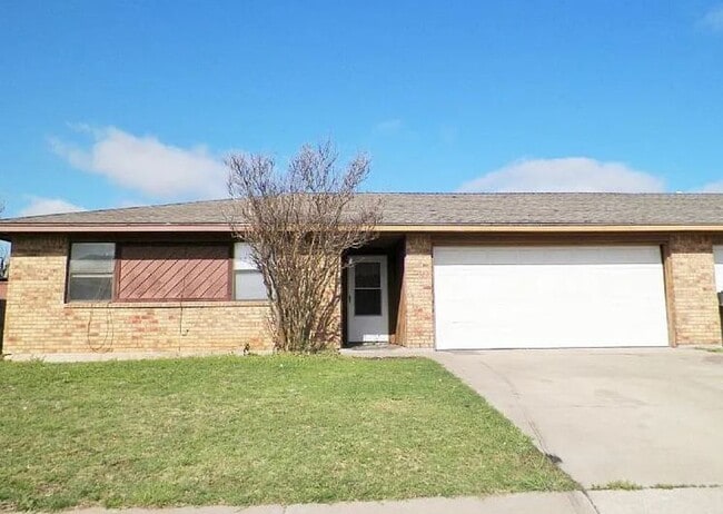 property at 2704 NW Friar Tuck Ln