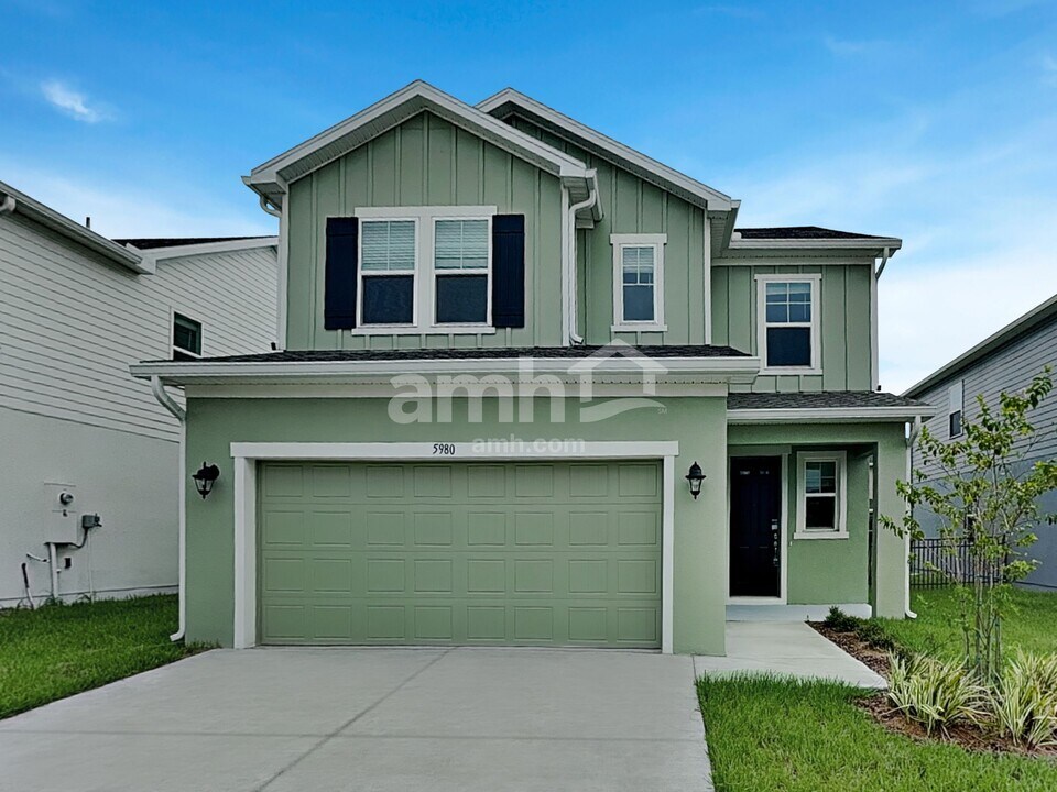 5980 Pinewood Ests Dr in St. Cloud, FL - Building Photo