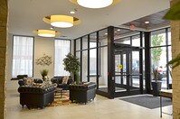 Come home through a private, Secured Lobby with a free coffee station - Icon Tower Apartamentos in Syracuse, New York