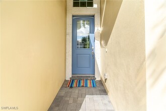 6939 Cay Ct in Naples, FL - Foto de edificio - Building Photo