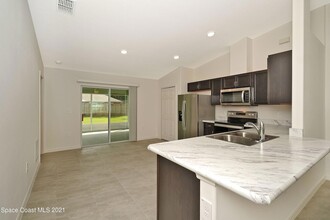 231 Mardi Gras Ave NW, Unit 2207 in Palm Bay, FL - Building Photo - Building Photo