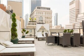 134-136-136 Fulton St in New York, NY - Building Photo - Building Photo