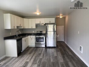 4832 S L St, Unit 1 in Tacoma, WA - Foto de edificio - Building Photo