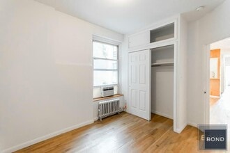 68 E 1st St in New York, NY - Building Photo - Building Photo