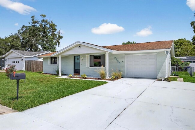 7725 Summertree Ln, Unit L402003D in New Port Richey, FL - Building Photo - Building Photo