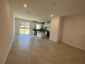 1160 Lakeshore Breeze Pl in Kissimmee, FL - Foto de edificio - Building Photo