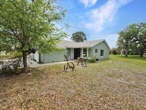 1480 SE Rivergreen Cir in Port St. Lucie, FL - Foto de edificio - Building Photo