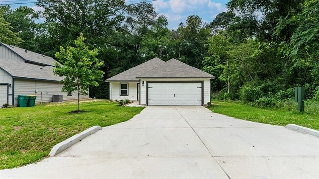 410 Pimmit Hill Run in Montgomery, TX - Building Photo - Building Photo