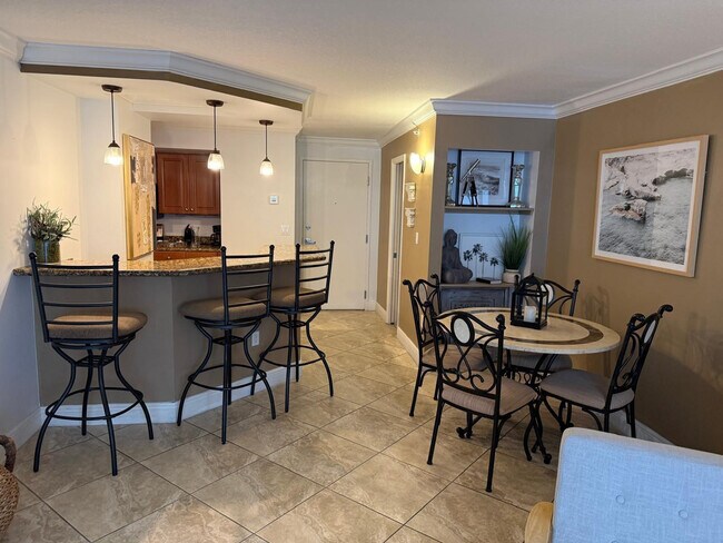 property at 6917 Collins Ave