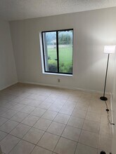 703 Sunny Pine Way in Greenacres, FL - Building Photo - Building Photo