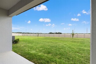 9058 Rally Spring Lp in Wesley Chapel, FL - Building Photo - Building Photo