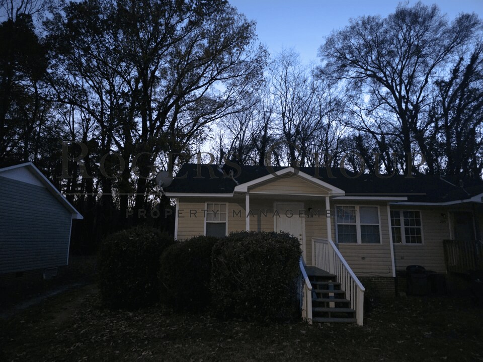 208-210 Cooper St in Louisburg, NC - Building Photo