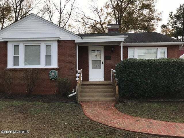 property at 702 E 3rd St