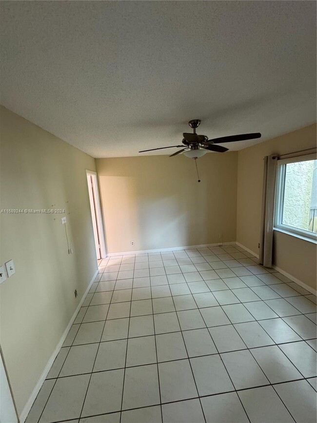 3280 Spanish Moss Ter, Unit 111 in Lauderhill, FL - Building Photo - Building Photo