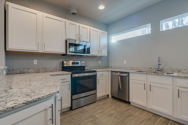 Hog Trough Luxury Townhomes of Fayetteville in Fayetteville, AR - Building Photo - Building Photo