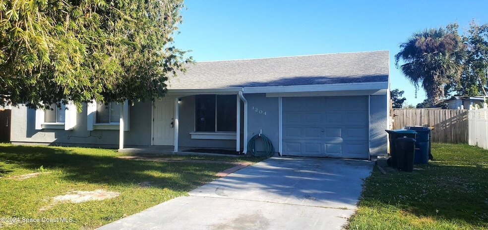 1204 Linmoor Cir NE in Palm Bay, FL - Building Photo