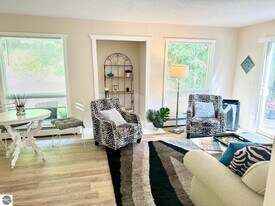 6031 Brackett Rd in Williamsburg, MI - Building Photo