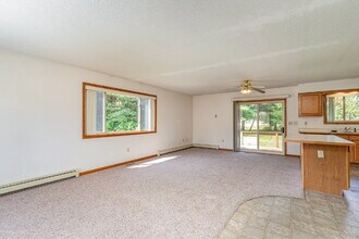 47 E Mustang Ln in Sanford, MI - Building Photo - Building Photo