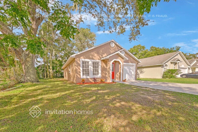 6561 Redwood Oaks Dr in Orlando, FL - Foto de edificio - Building Photo