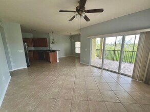 10060 Lake Cove Dr in Ft. Myers, FL - Building Photo - Building Photo
