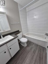 10028-10105 105 Ave in Grande Prairie, AB - Building Photo - Building Photo