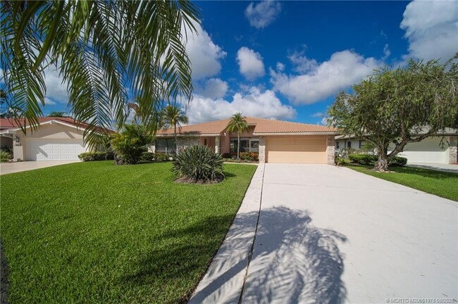 property at 2284 SW Spoonbill Dr