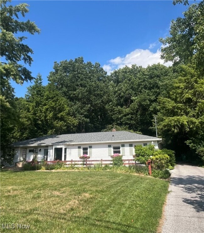 property at 5819 S Shandle Blvd