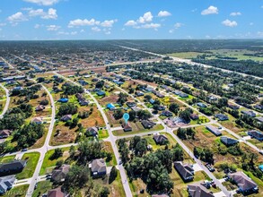 4461 26th St SW in Lehigh Acres, FL - Foto de edificio - Building Photo