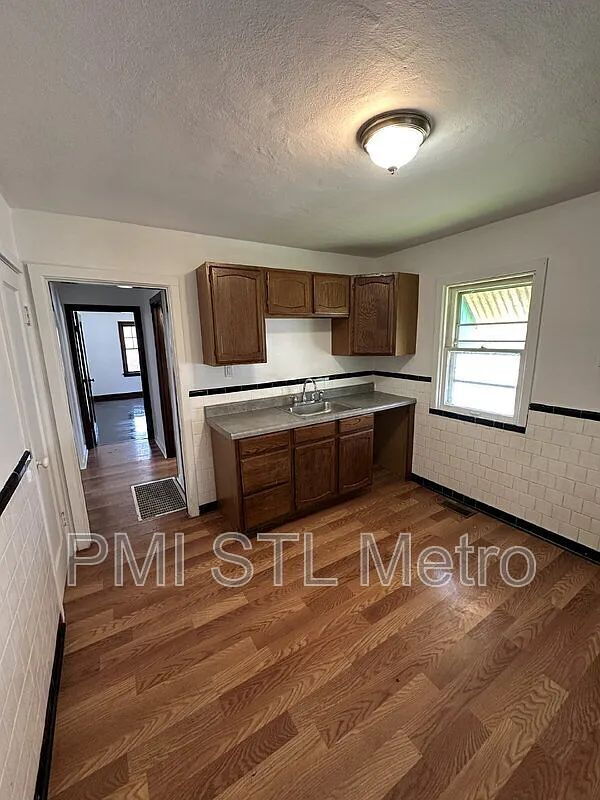 7117 Garesche Ave in Jennings, MO - Building Photo - Building Photo