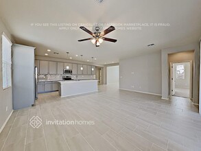 14438 W Whispering Wind Dr in Surprise, AZ - Building Photo - Building Photo