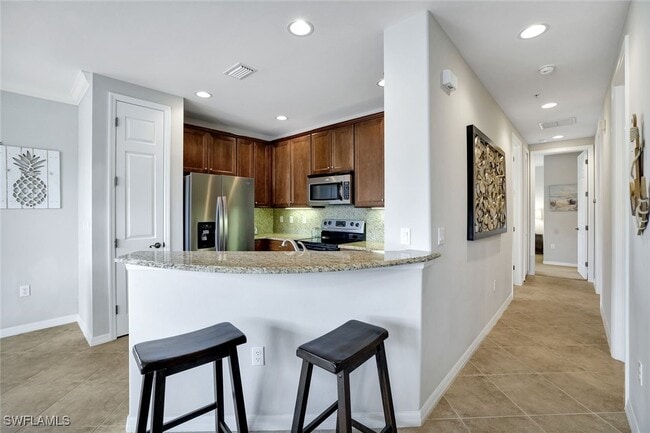 1383 Artesia Dr E in Naples, FL - Building Photo - Building Photo