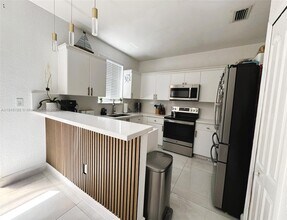 7020 NW 177th St in Miami Gardens, FL - Building Photo - Building Photo