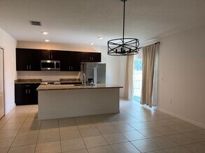 3725 SW Kasin St in Port St. Lucie, FL - Building Photo - Building Photo