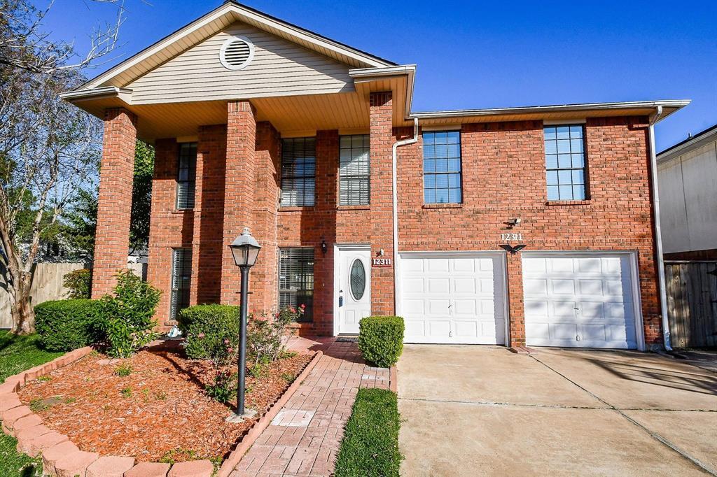 12311 Grove Meadow Dr in Stafford, TX - Building Photo