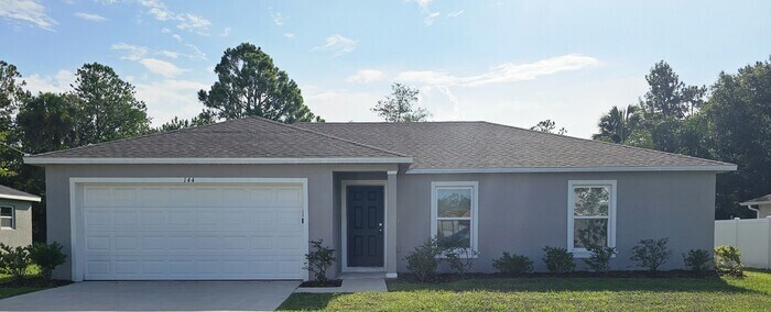 144 Bird of Paradise Dr in Palm Coast, FL - Building Photo