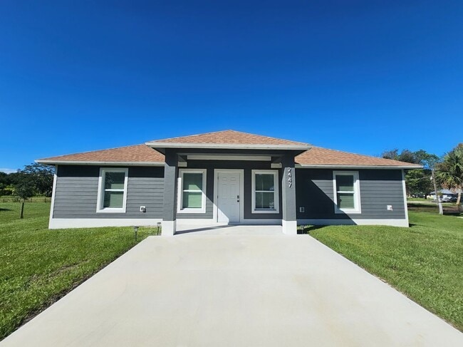 property at 2447 NW 5th St