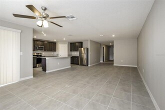 1698 Hideaway Flat St in Mascotte, FL - Building Photo - Building Photo