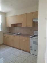 1449 NE 131st St-Unit -1451 in North Miami, FL - Building Photo - Building Photo