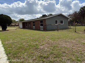 1295 Country Club Blvd in Titusville, FL - Building Photo - Building Photo