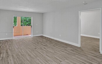1 Alhambra Cir-Unit -203 in Coral Gables, FL - Building Photo - Building Photo