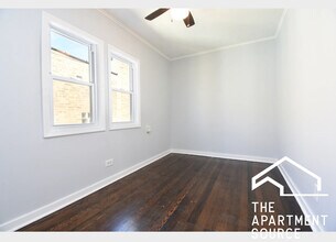 5128 W Henderson St, Unit 1 in Chicago, IL - Building Photo - Building Photo