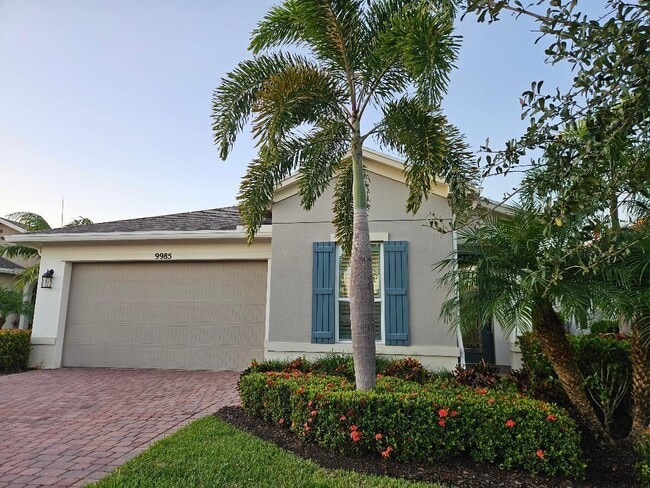 property at 9985 SW Trumpet Tree Cir