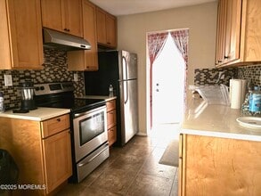 34 Meadow Green Cir in Englishtown, NJ - Building Photo - Building Photo