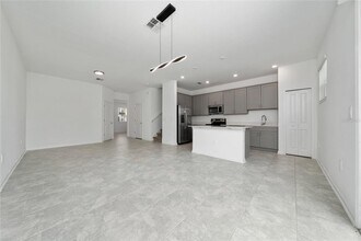 7720 Stone Crk Trl in Kissimmee, FL - Building Photo - Building Photo